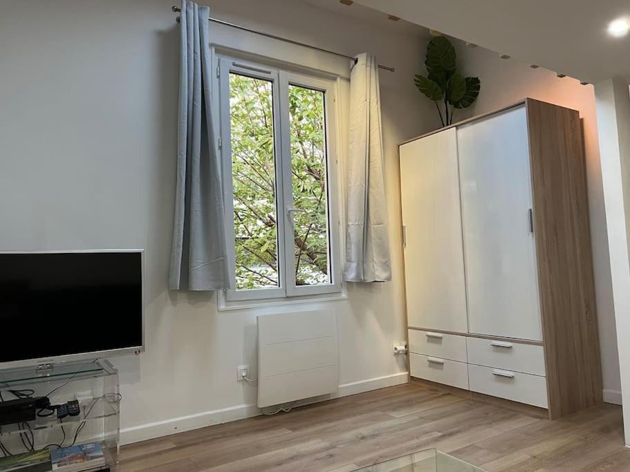 Paris : Charmant 2 Pieces Au Calme Apartment Екстериор снимка